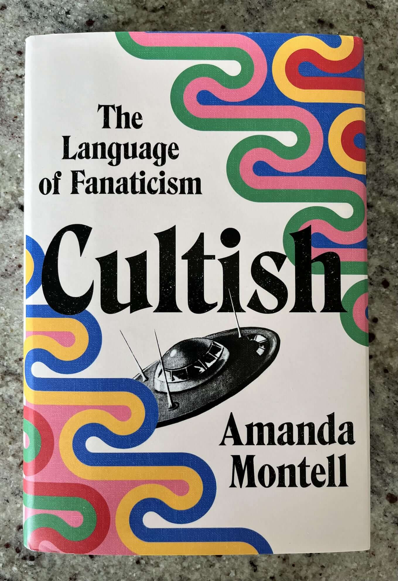 “Cultish: The Language of Fanaticism” by Amanda Montell.